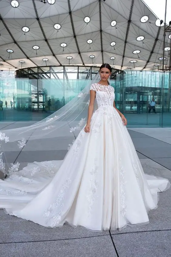 The Ultimate Guide to Choosing Wedding Dresses with a Long Train 25 Ideas